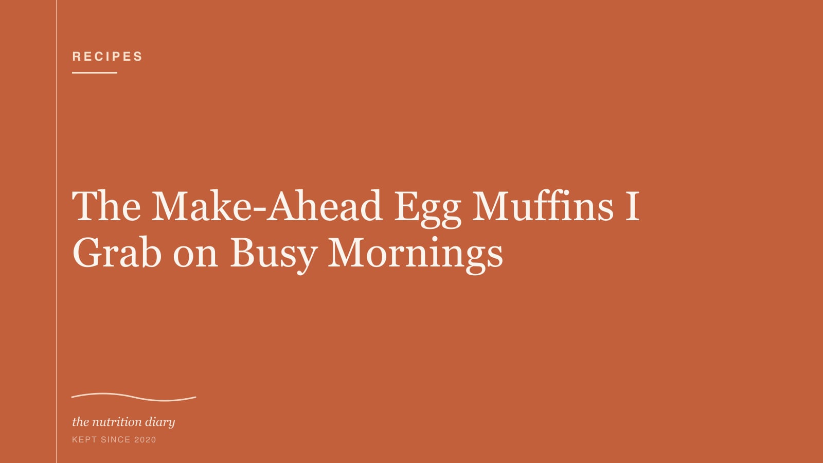 A muffin tin of golden baked egg muffins flecked with spinach and red pepper